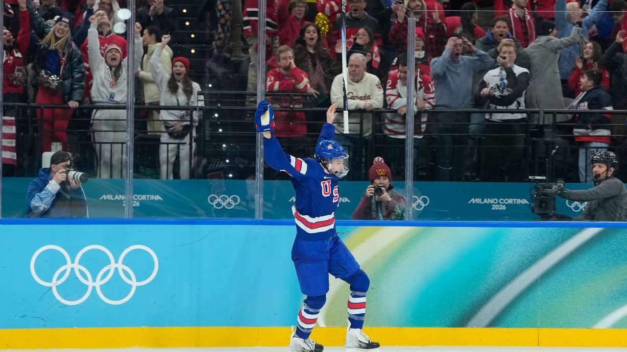 United States' Megan Keller (5) celebrates scoring the winning goal during a women's ice hockey gold medal game between the United States and Canada at the 2026 Winter Olympics, in Milan, Italy, Thursday, Feb. 19, 2026.