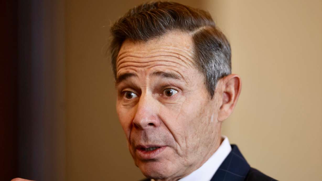 Utah Sen. John Curtis speaks to reporters at the Capitol in Salt Lake City on Feb. 19. Curtis said a wedding after-party for President Donald Trump's son that was financed by a Russian oligarch was "corruption."