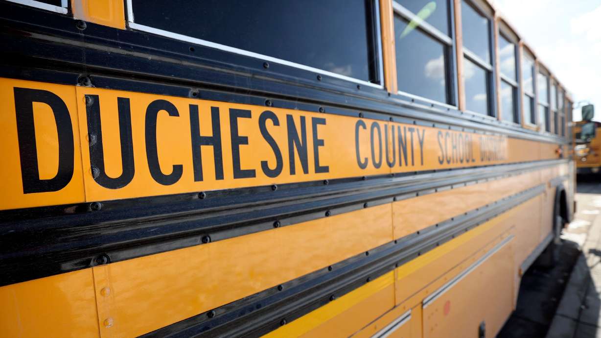 A Duchesne County School District bus is pictured outside of the Capitol in Salt Lake City, on Tuesday, Feb. 7, 2023.