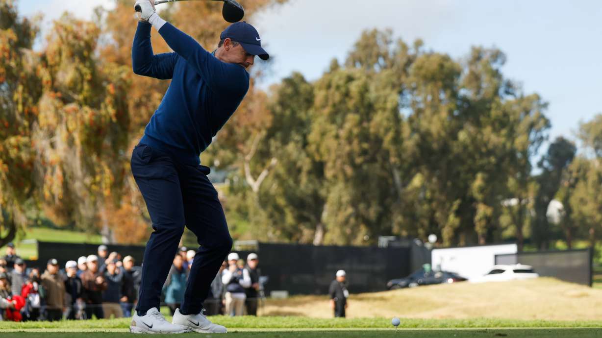 Rory McIlroy, from Northern Ireland, hits from the ninth tee during the first round of the Genesis Invitational golf tournament at Riviera Country Club, Thursday, Feb. 19, 2026, in the Pacific Palisades area of Los Angeles.