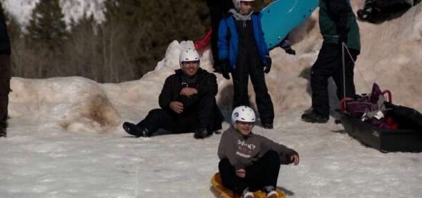 Experts urge families to wear helmets while sledding