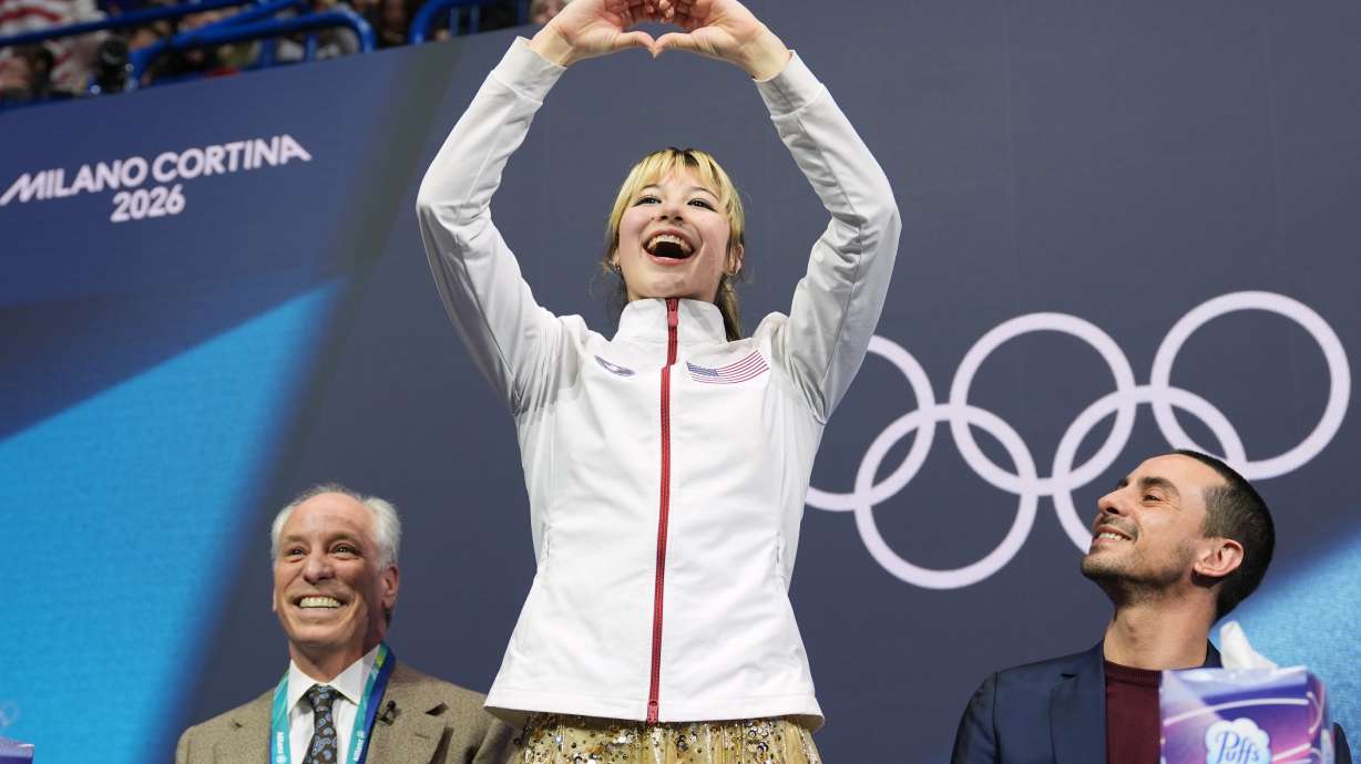 Alysa Liu of the United States reacts to her score after competing in the women's figure skating free program at the 2026 Winter Olympics, in Milan, Italy, Thursday, Feb. 19, 2026.