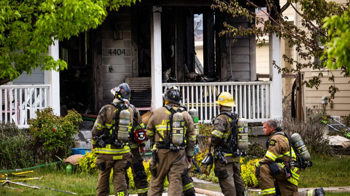 Firefighters at a house fire in West Jordan on May 11, 2025. The American Red Cross of Utah responded to 154 home fires in 2025 while helping 728 people with emergency assistance, the organization shared in a recent northern Utah report.