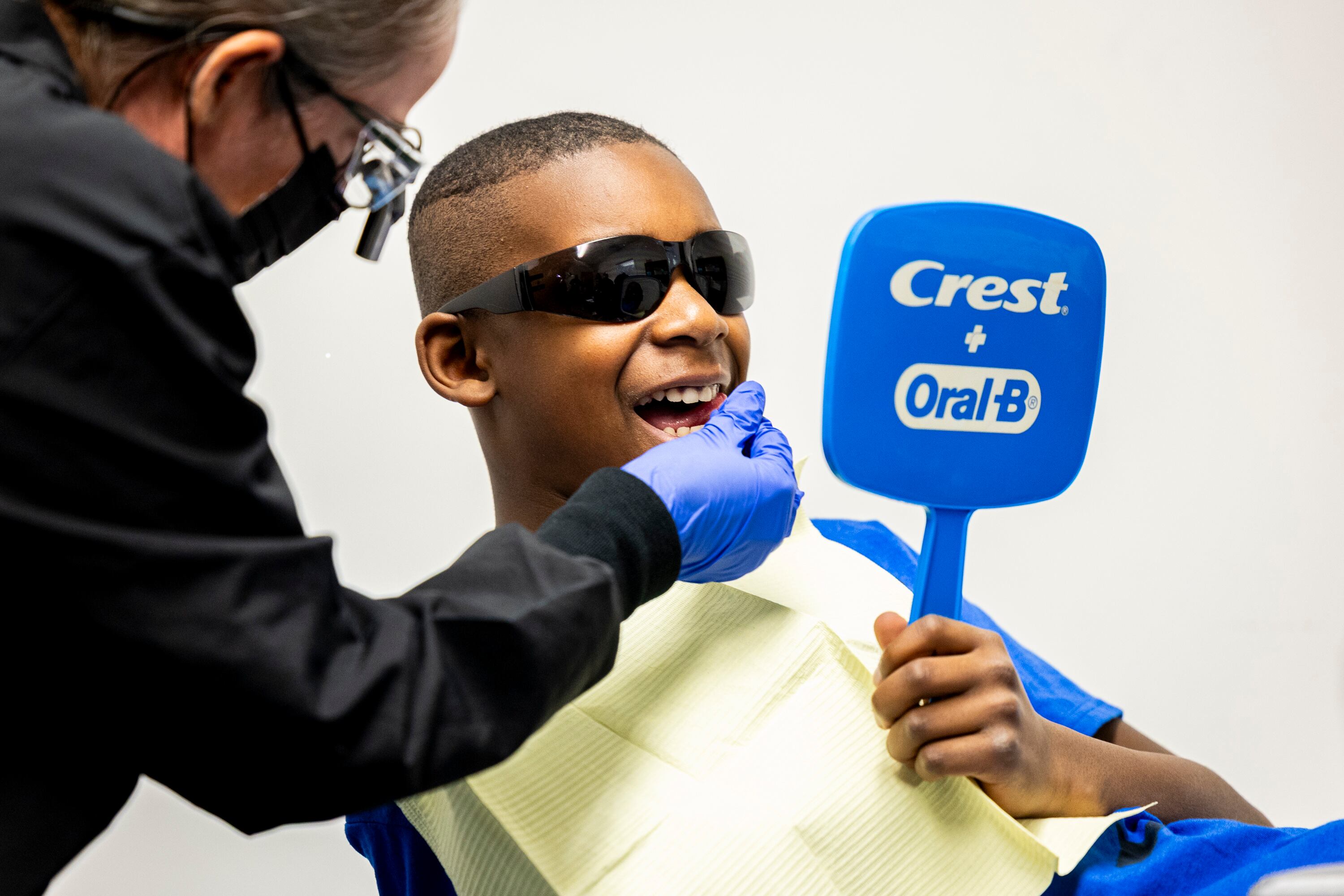 Amy Rose checks out the teeth of Brigham Larsen during a weekly dental clinic in Orem on April 9, 2025. Sen. Luz Escamilla, D-Salt Lake City, has introduced another bill that would help uninsured children have access to dental care.