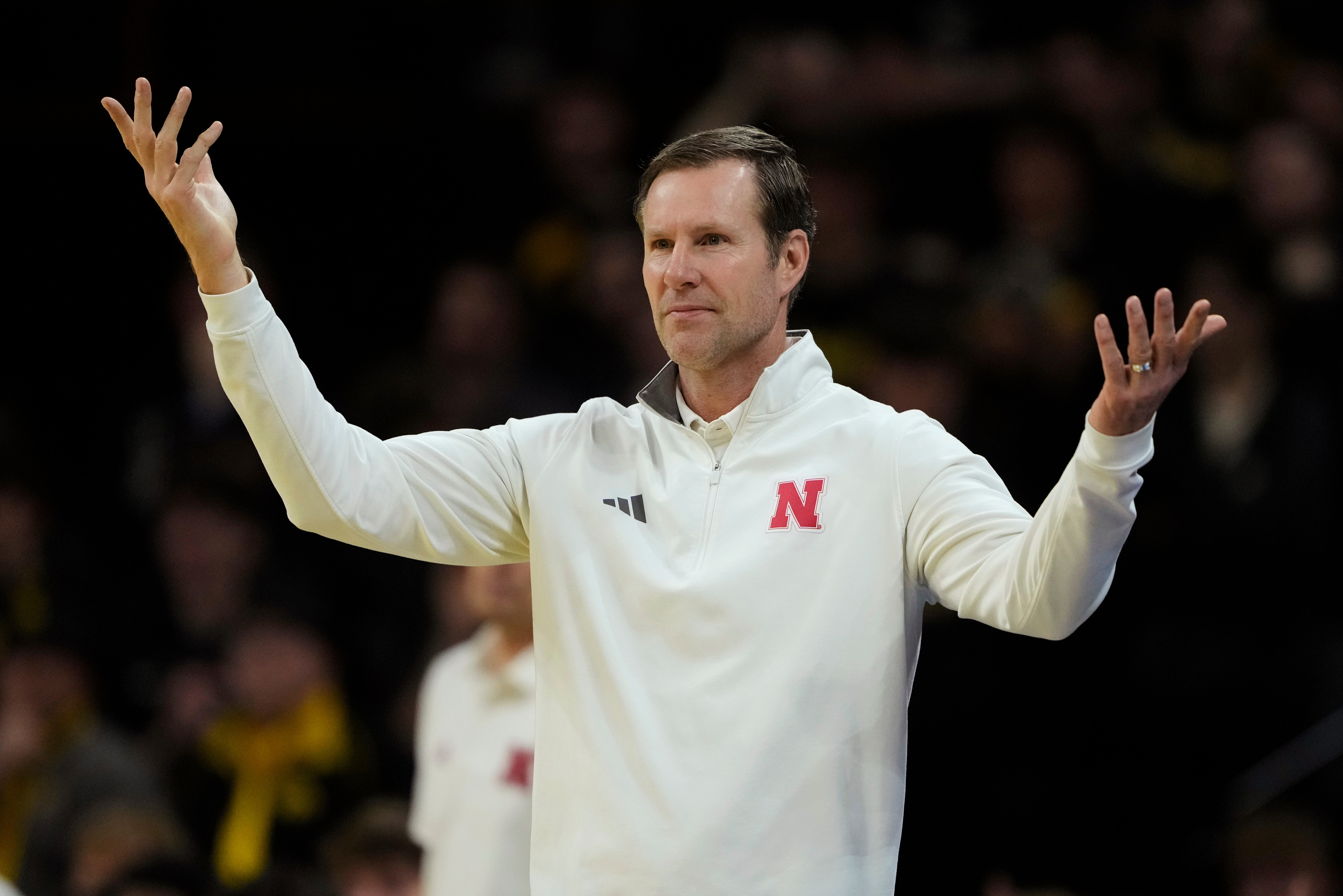 Nebraska coach Hoiberg says part of the reason he swiped at fan's phone is because of his pacemaker