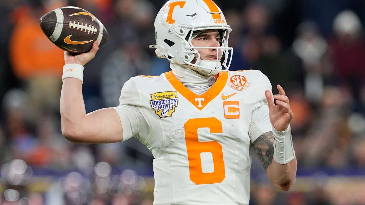 FILE - Tennessee quarterback Joey Aguilar (6) looks to throw a pass during the second half of the Music City Bowl NCAA college football game against Illinois, Dec. 30, 2025, in Nashville, Tenn.