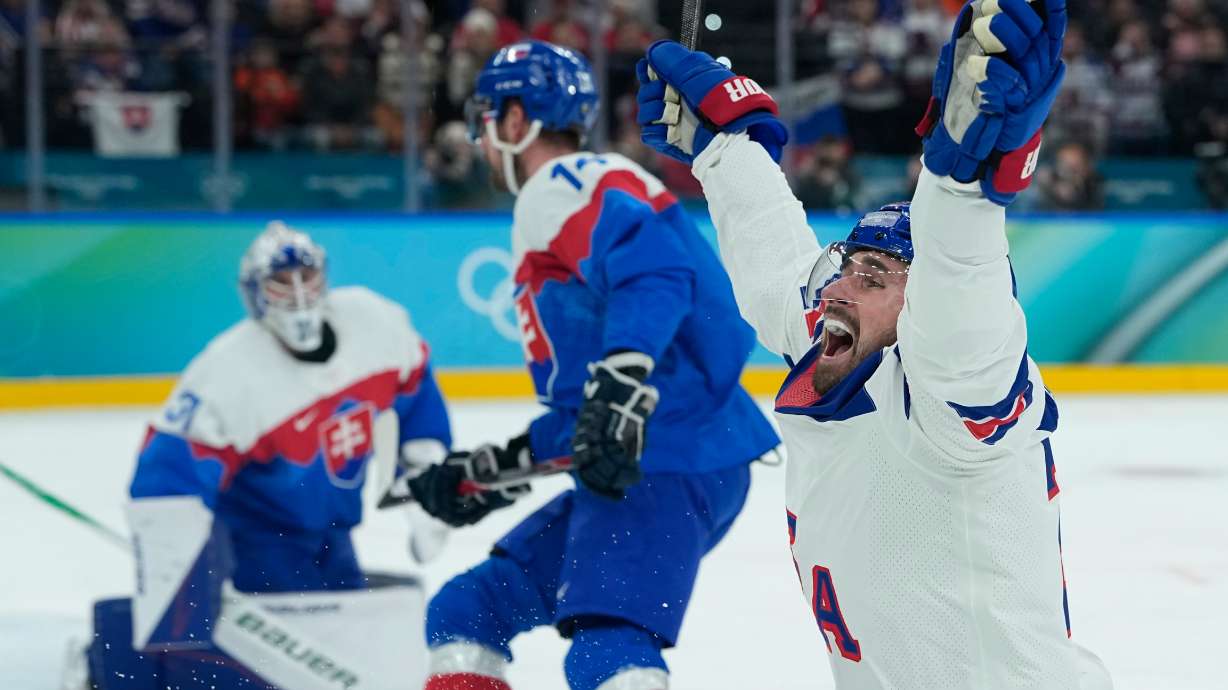 United States' Dylan Larkin (21) celebrates after scoring the opening goal during a men's ice hockey semifinal game between United States and Slovakia at the 2026 Winter Olympics, in Milan, Italy, Friday, Feb. 20, 2026.