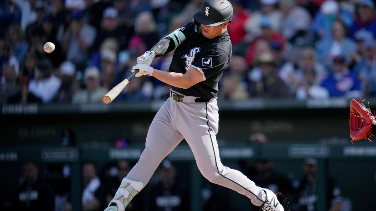 Chicago White Sox's Munetaka Murakami, of Japan, connects for a two-run double against the Chicago Cubs during the fourth inning of a spring training baseball game Friday, Feb. 20, 2026, in Mesa, Ariz.