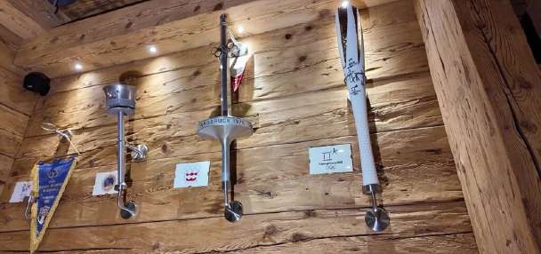 Cortina collector lines his restaurant with Olympic torches