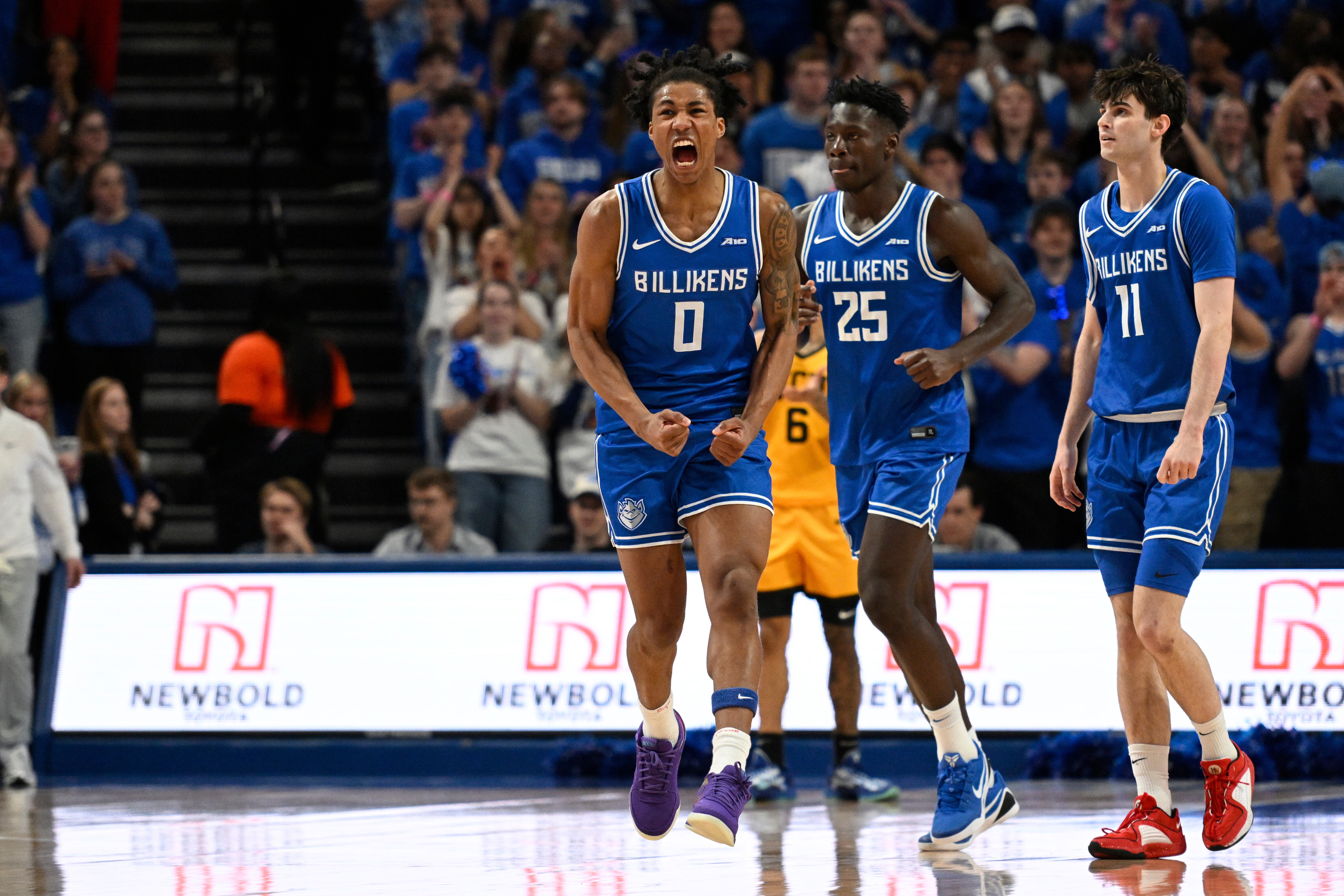 Saint Louis' Kellen Thames (0) reacts after scoring during the first half of an NCAA college basketball game against Virginia Commonwealth, Friday, Feb. 20, 2026, in St. Louis. 