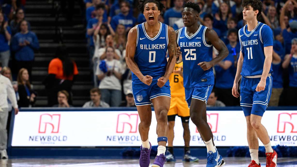 Saint Louis' Kellen Thames (0) reacts after scoring during the first half of an NCAA college basketball game against Virginia Commonwealth, Friday, Feb. 20, 2026, in St. Louis.
