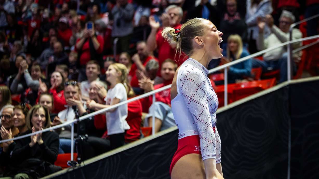 Red Rocks’ Avery Neff celebrates after competing on the vault during an NCAA gymnastics meet against Southern Utah held at the Huntsman Center in Salt Lake City on Friday, Feb. 20, 2026. Neff received a 10.