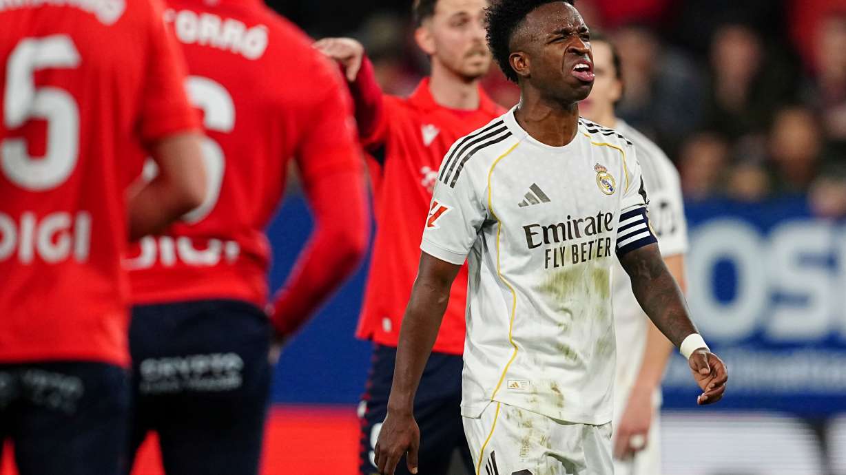 Real Madrid's Vinicius Junior reacts during a Spanish La Liga soccer match between Osasuna and Real Madrid in Pamplona, Spain, Saturday, Feb. 21, 2026.