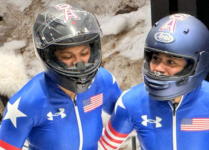 Kaysha Love and Azaria Hill exit the track after their fourth run at the two-woman bobsled event at the 2026 Winter Olympics, Saturday. Love, from Herriman, and Hill finished the event in fifth place.