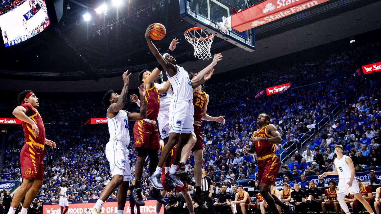 BYU forward AJ Dybantsa (3) grabs his own rebound against Iowa State during an NCAA basketball game held at the Marriott Center in Provo on Saturday, Feb. 21, 2026.