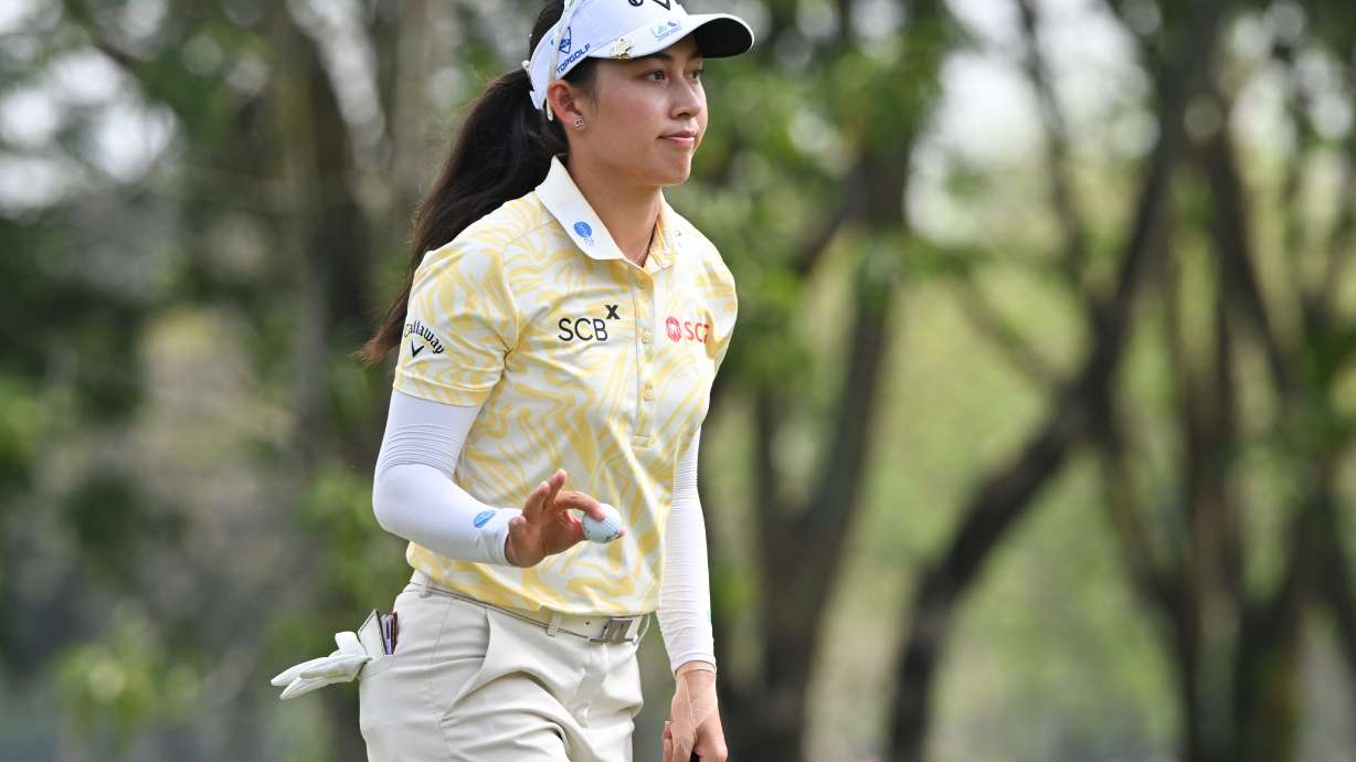 Jeeno Thitikul of Thailand reacts after putting on the 2nd hole during the final round of the LPGA Honda Thailand golf tournament in Pattaya, Thailand, Sunday, Feb. 22, 2026.