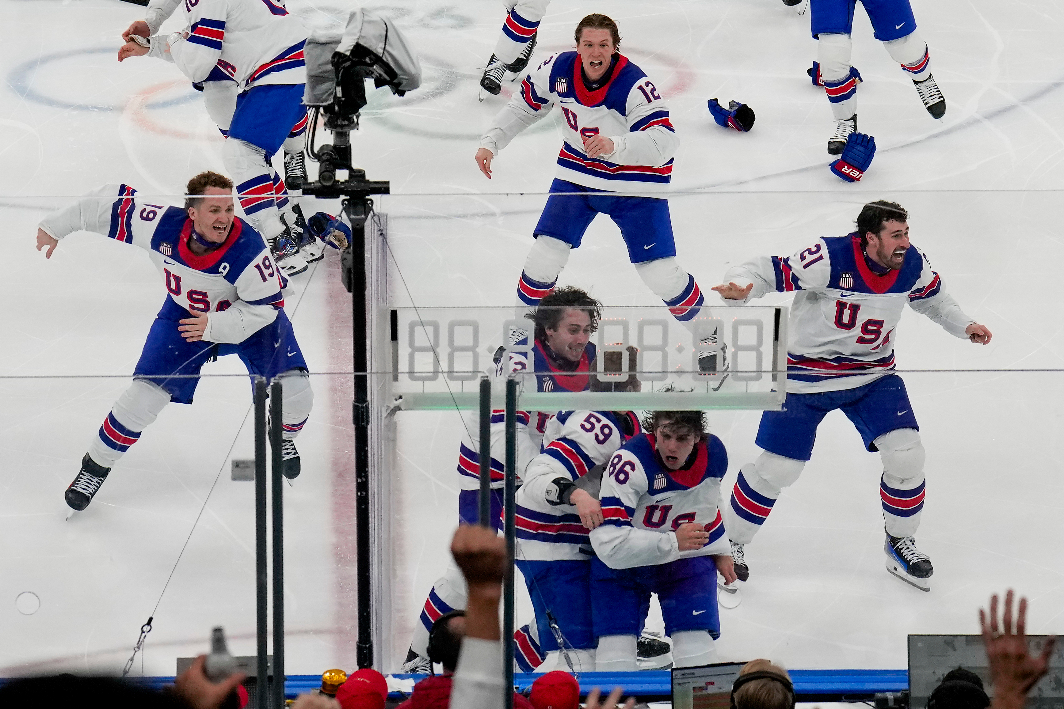 U.S. wins men's hockey gold in the final medal event of the Winter Olympics, in photos