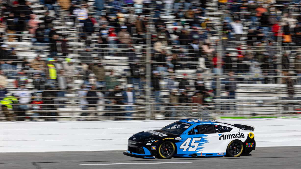 Tyler Reddick drives on the track during a NASCAR Cup Series auto race, Sunday, Feb. 22, 2026, in Hampton, Ga.