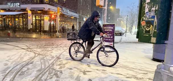 Snowfall intensifies in Northeast, with many stuck at home under blizzard warnings, travel bans