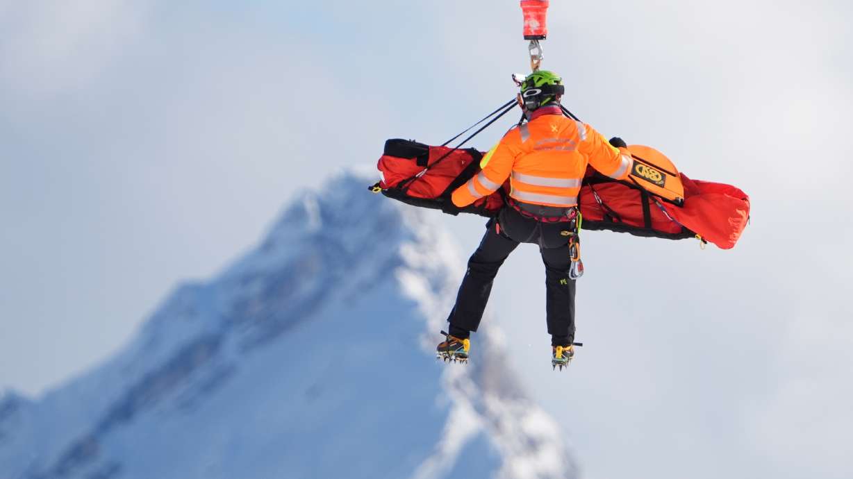 United States' Lindsey Vonn is airlifted away after a crash during an alpine ski women's downhill race, at the 2026 Winter Olympics, in Cortina d'Ampezzo, Italy, Sunday, Feb. 8, 2026.