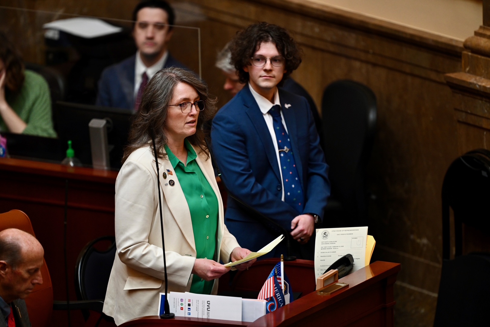 Rep Nicholeen P. Peck, R-Tooele, presents Utah Valley University Turning Point USA Chapter President Caleb Chilcutt legislative citations honoring the life and service of Charlie Kirk at the Capitol in Salt Lake City on Monday.