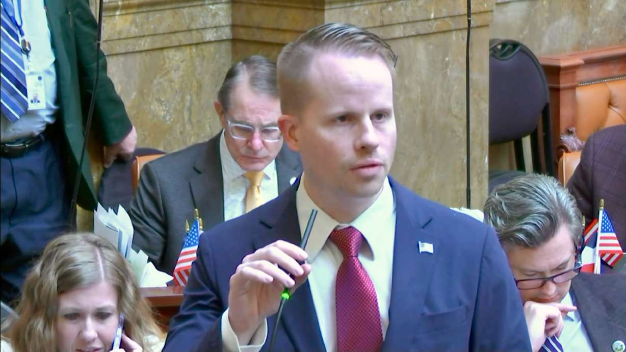 Utah Rep. Trevor Lee, R-Layton, discusses HB88, targeting immigrants in the country illegally, on the floor of the Utah House in Salt Lake City on Monday. Lawmakers circled the controversial measure.