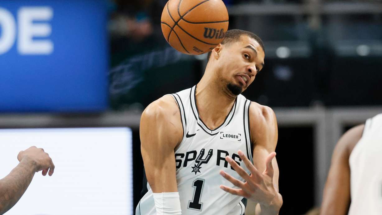 San Antonio Spurs forward Victor Wembanyama cannot grab a rebound during the first half of an NBA basketball game against the Detroit Pistons, Monday, Feb. 23, 2026, in Detroit.