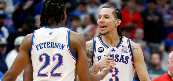White scores 23 as No. 14 Kansas rebounds with 69-56 win over No. 5 Houston
