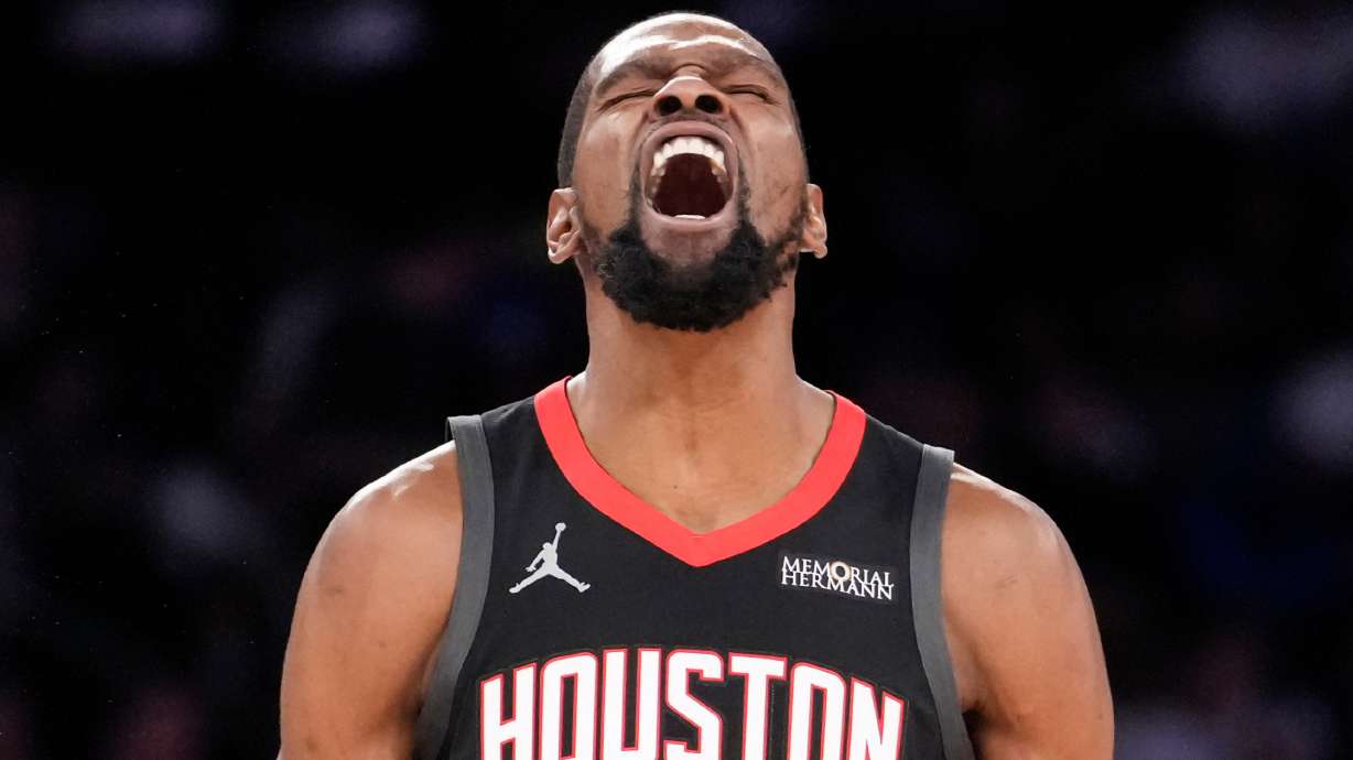Houston Rockets forward Kevin Durant (7) reacts after scoring a 3-point goal during the second half of an NBA basketball game, Saturday, Feb. 21, 2026, in New York.