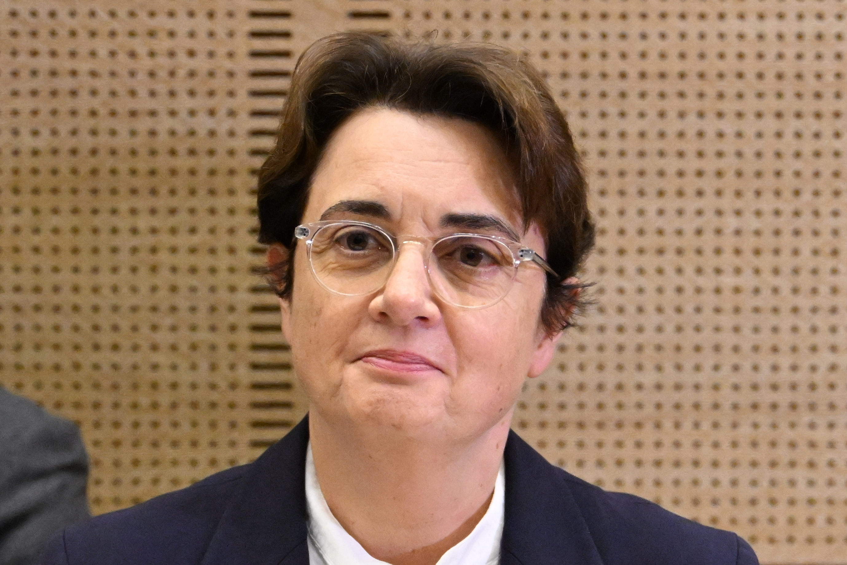 Laurence des Cars, director of Le Louvre museum, poses before a hearing at the Culture commission of the Senate, three days after historic jewels were stolen in a daring daylight heist, Oct. 22, 2025, in Paris. French President Emmanuel Macron has accepted the resignation of des Cars.