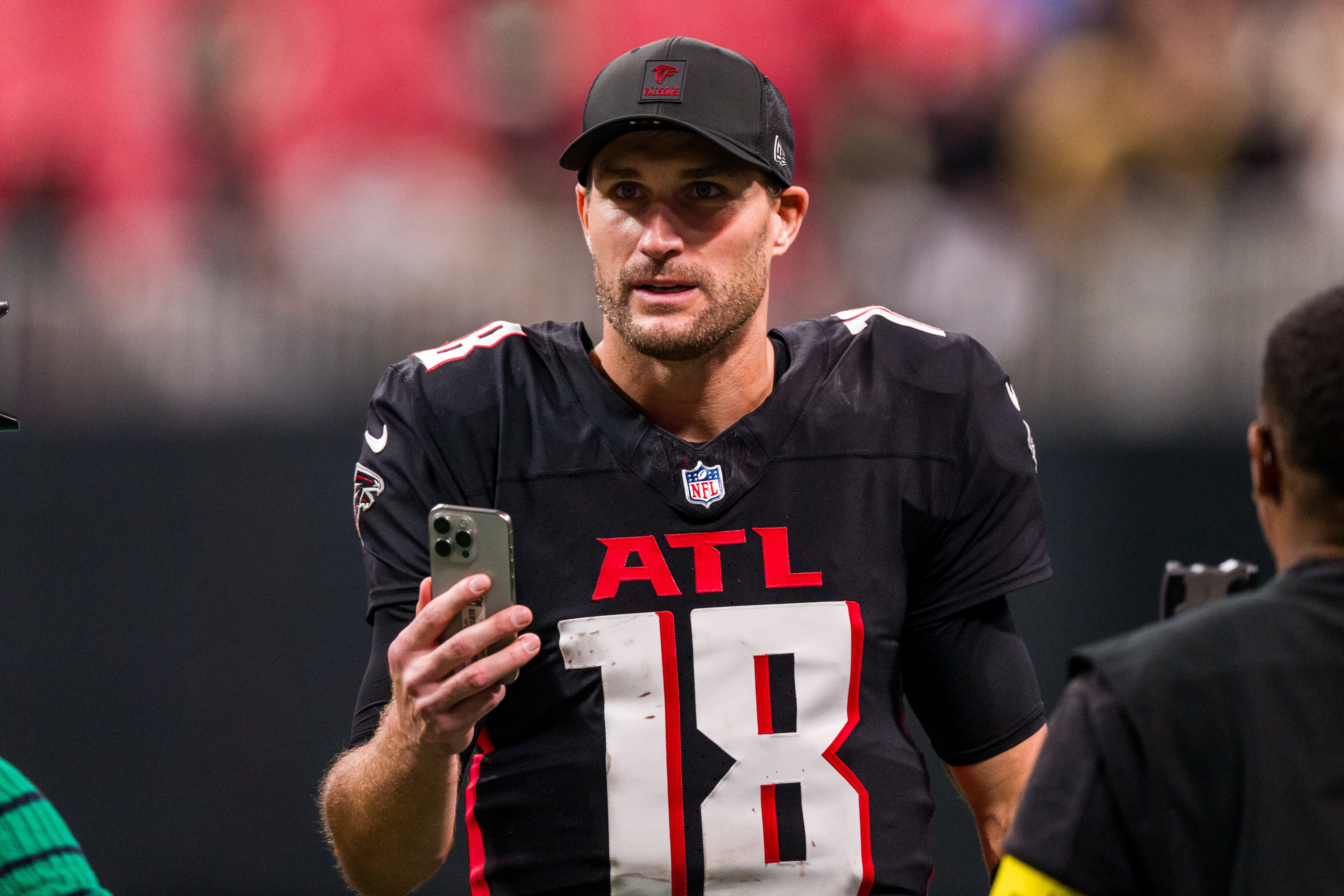 FILE - Atlanta Falcons quarterback Kirk Cousins (18) walks off the field after an NFL football game against the New Orleans Saints, Sunday, Jan. 4, 2026, in Atlanta. 