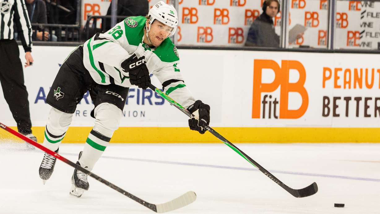 Dallas Stars right wing Mikko Rantanen (96) passes the puck against the Utah Mammoth during the second period of an NHL hockey game Saturday, Jan. 31, 2026, in Salt Lake City.