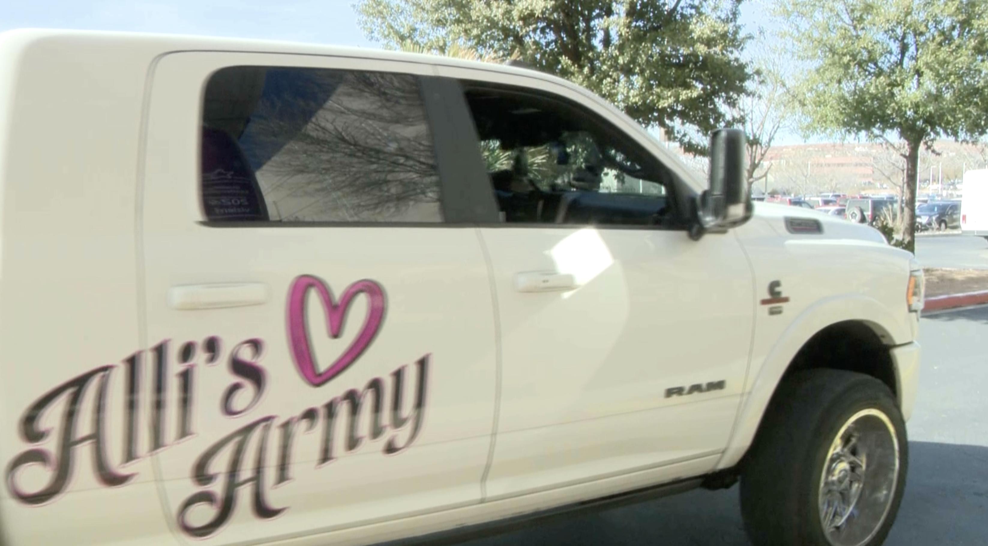 Kelton Allred drives a truck with "Alli's Army" painted on the side, in honor of his daughter, Alli Allred, who was in an e-bike collision in December.