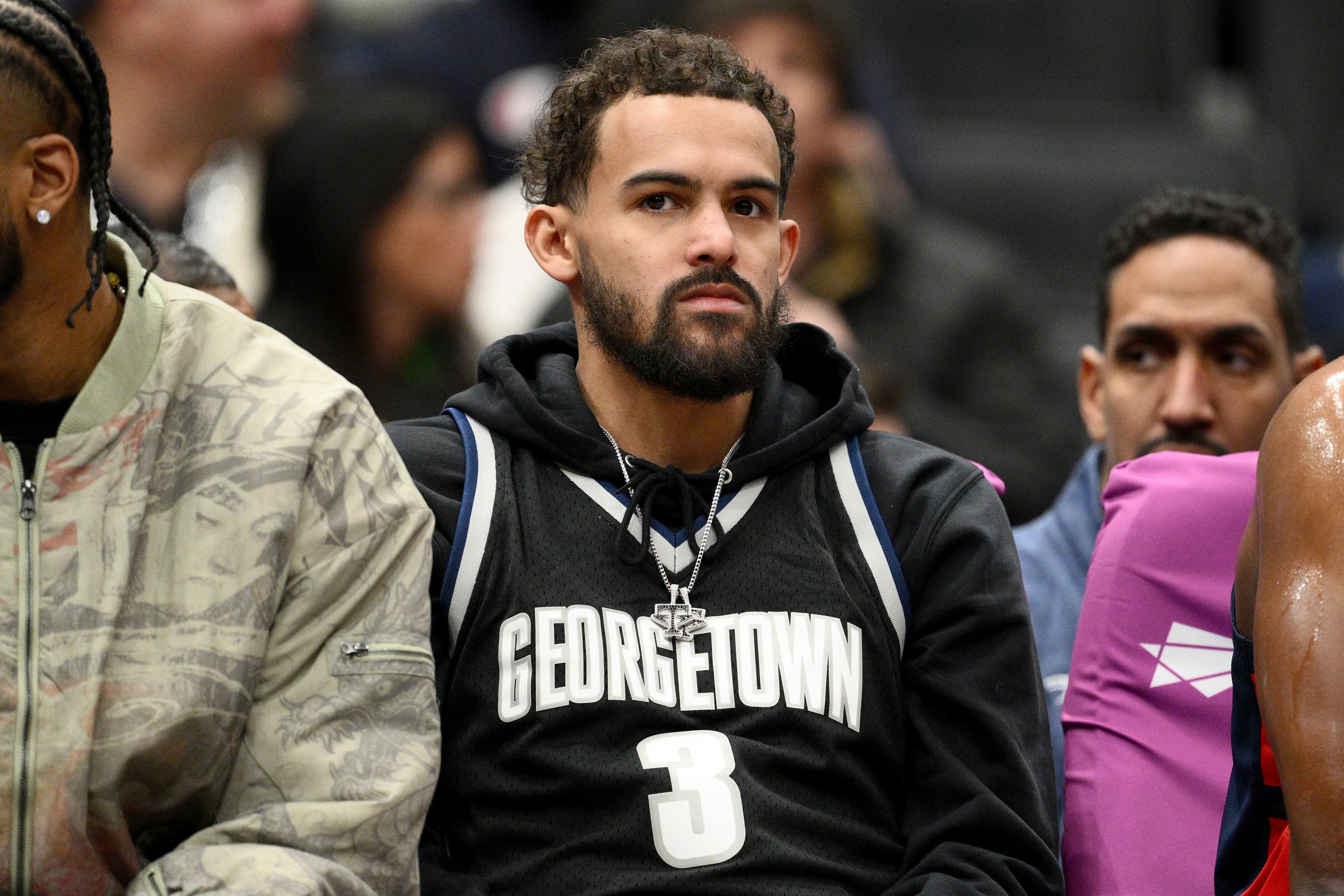 FILE - Washington Wizards guard Trae Young, center, looks on from the bench during the first half of an NBA basketball game against the Los Angeles Clippers, Jan. 19, 2026, in Washington.