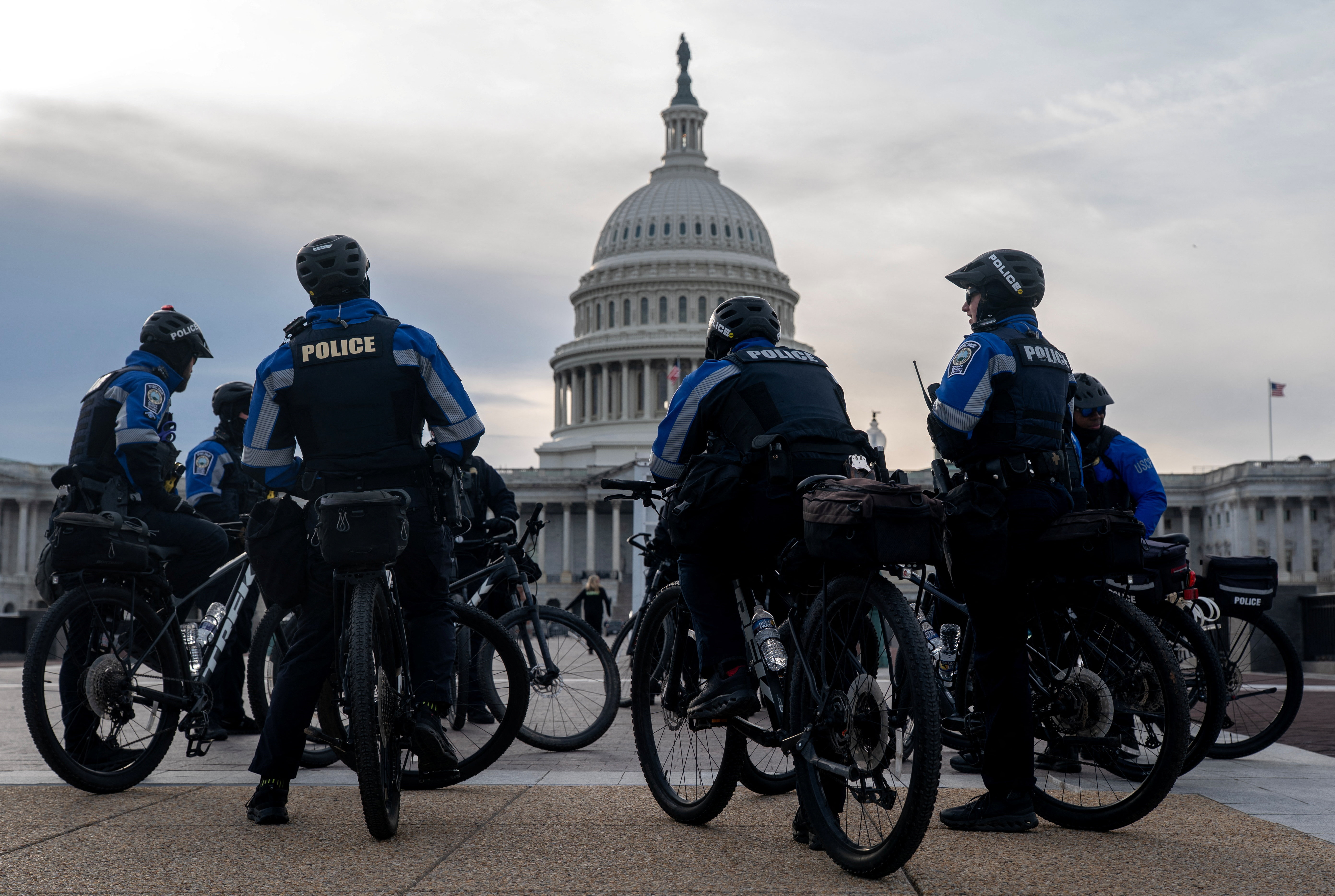 Members of the Capitol Police patrol near the Capitol ahead of the State of the Union address, in Washington, Tuesday. Officials are urging President Donald Trump to focus his speech on the economy.
