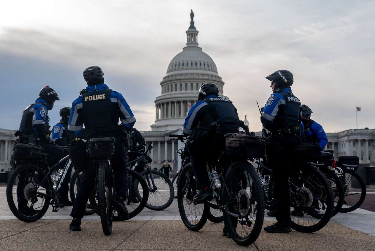 Members of the Capitol Police patrol near the Capitol ahead of the State of the Union address, in Washington, Tuesday. Officials are urging President Donald Trump to focus his speech on the economy.