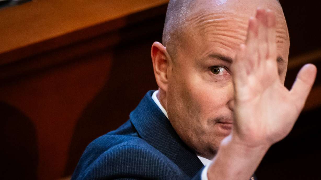 Gov. Spencer Cox waves to the crowd after his 2026 State of the State address in the House chamber at the Capitol in Salt Lake City on Jan. 22. Cox remains popular but polarizing in the state of Utah even as he gains popularity for his message of depolarization on the national stage, a new Deseret News/Hinckley Institute of Politics poll found.