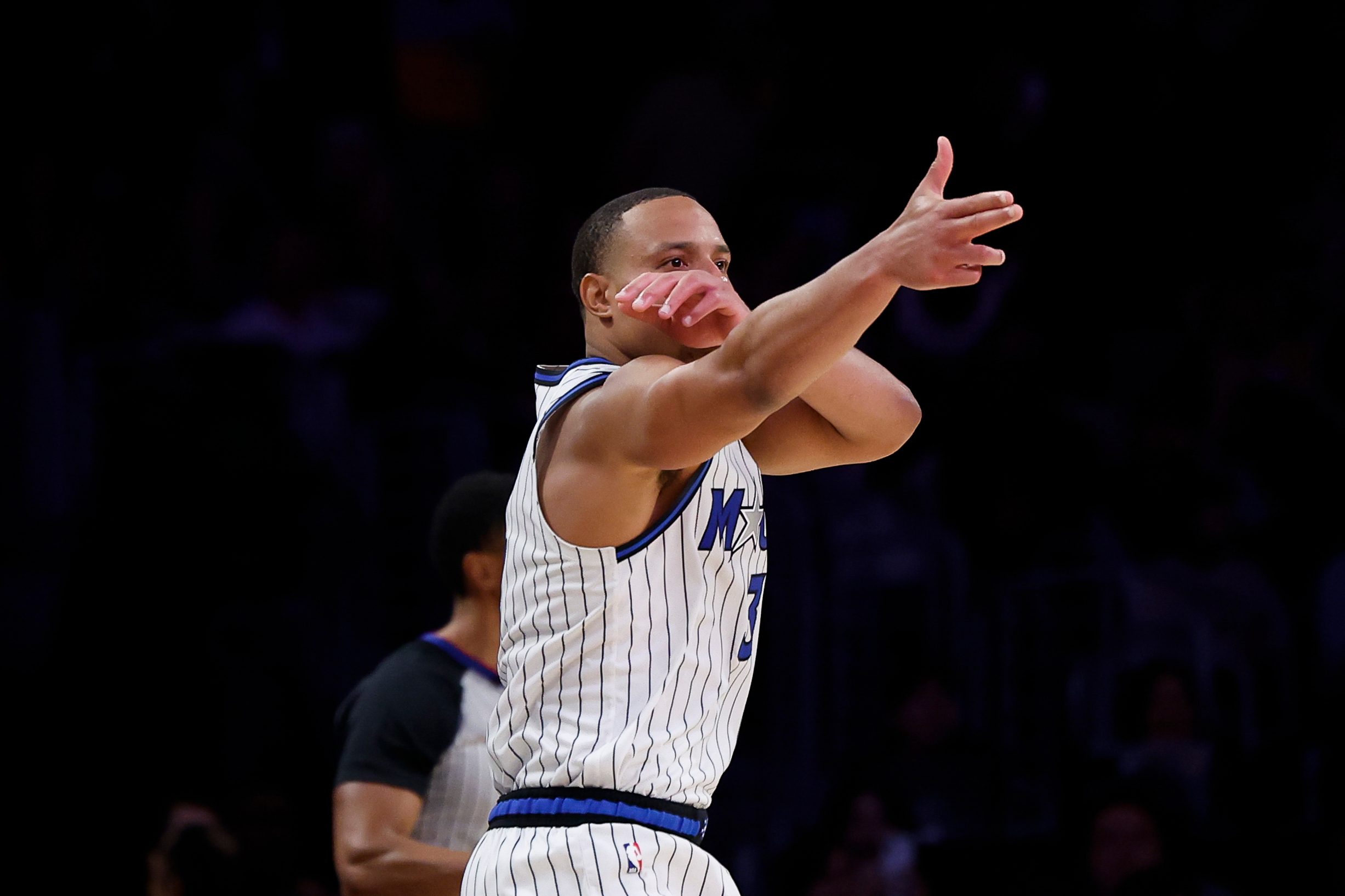 Orlando Magic guard Desmond Bane (3) reacts after shooting a 3-point shot during the second half of an NBA basketball game against the Los Angeles Lakers Tuesday, Feb. 24, 2026, in Los Angeles. 