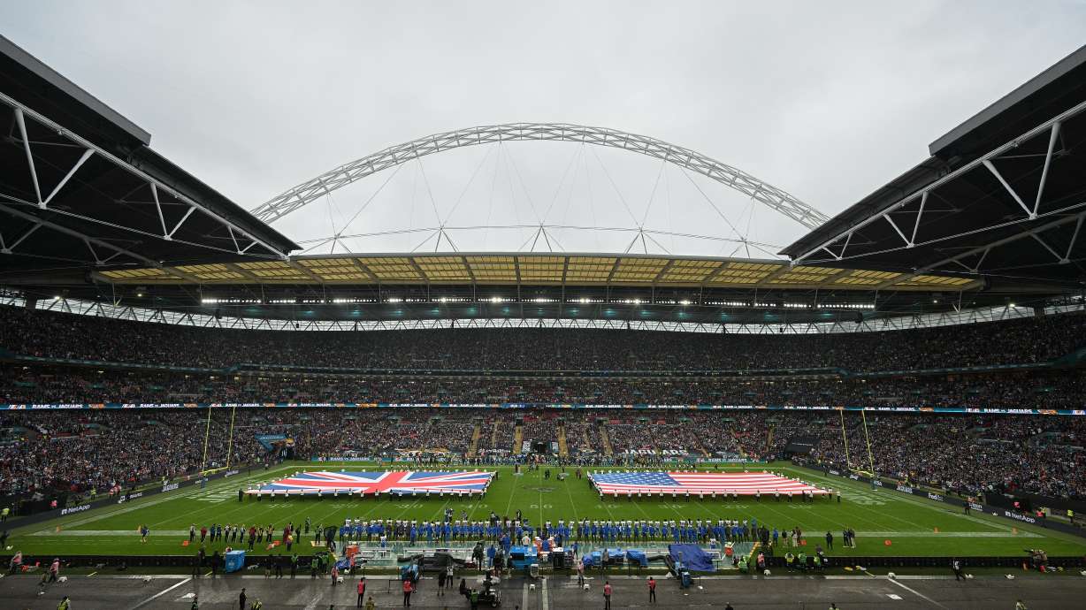 FILE - A general view of the flags of Britain and the United States on the field of Wembley stadium before an NFL football game between the Los Angeles Rams and the Jacksonville Jaguars in London, Sunday, Oct. 19, 2025.