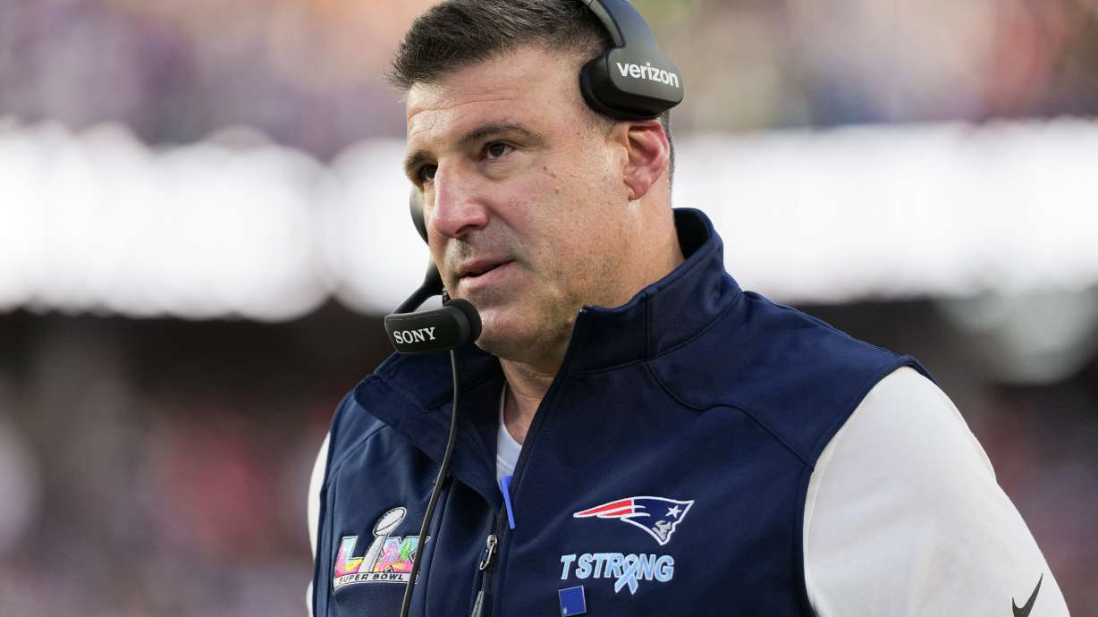 New England Patriots head coach Mike Vrabel walks along the sideline during the first half of the NFL Super Bowl 60 football game against the Seattle Seahawks, Sunday, Feb. 8, 2026, in Santa Clara, Calif.