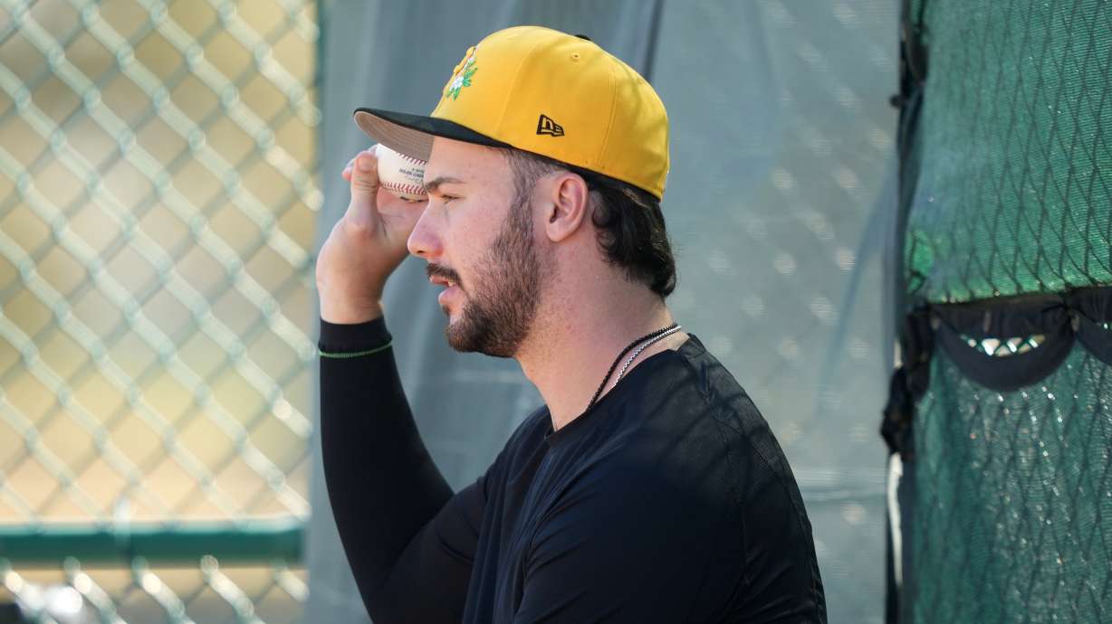 Pittsburgh Pirates' Paul Skenes watches a workout during spring training baseball Saturday, Feb. 14, 2026, in Bradenton, Fla.