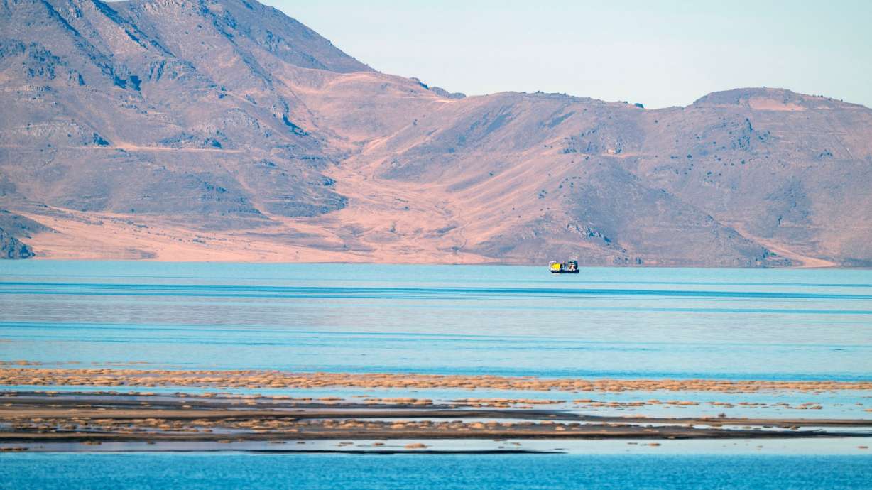 A brine shrimp boat moves in the water of the Great Salt Lake in Magna on Jan. 6. Utah's new constitutional court bill has triggered waves of lawsuits after it was signed into law two weeks ago.