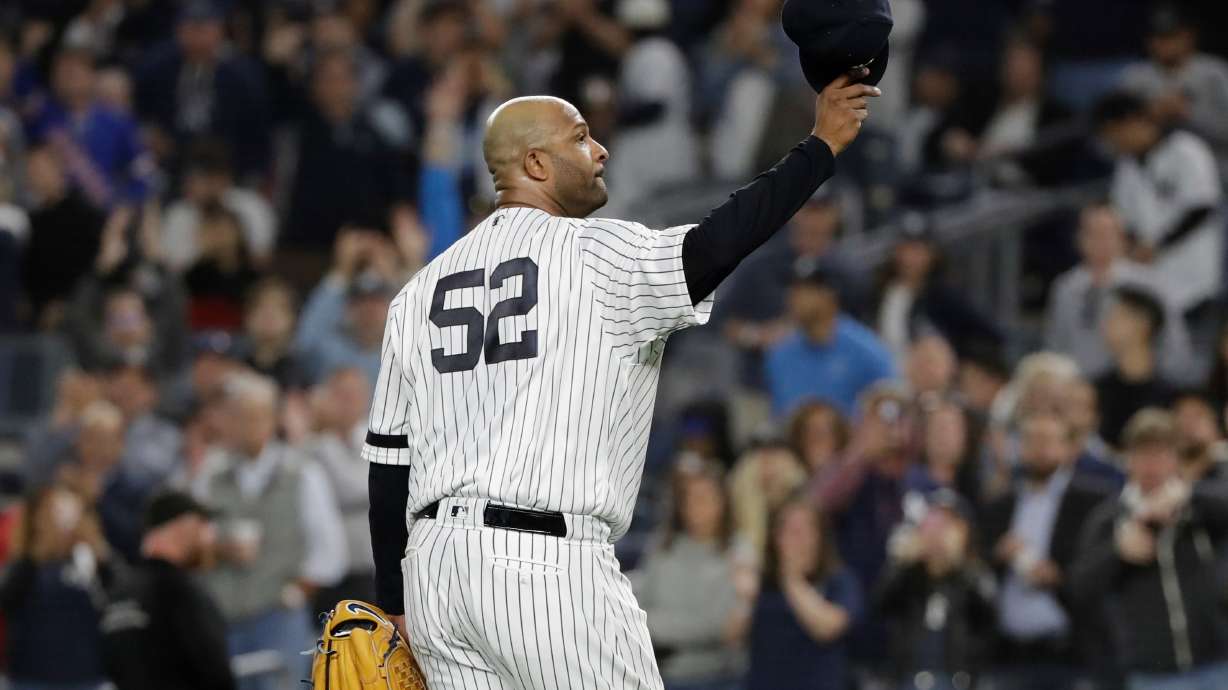 FILE - New York Yankees starting pitcher CC Sabathia gestures to fans as he leaves during the third inning of the team's baseball game against the Los Angeles Angels Sept. 18, 2019, in New York.