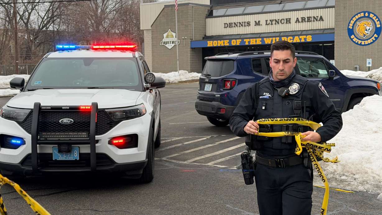 Police continue to tape off the Dennis M. Lynch arena a day after a deadly shooting during a youth hockey game on Tuesday, Feb. 17, 2026 in Pawtucket, R.I.