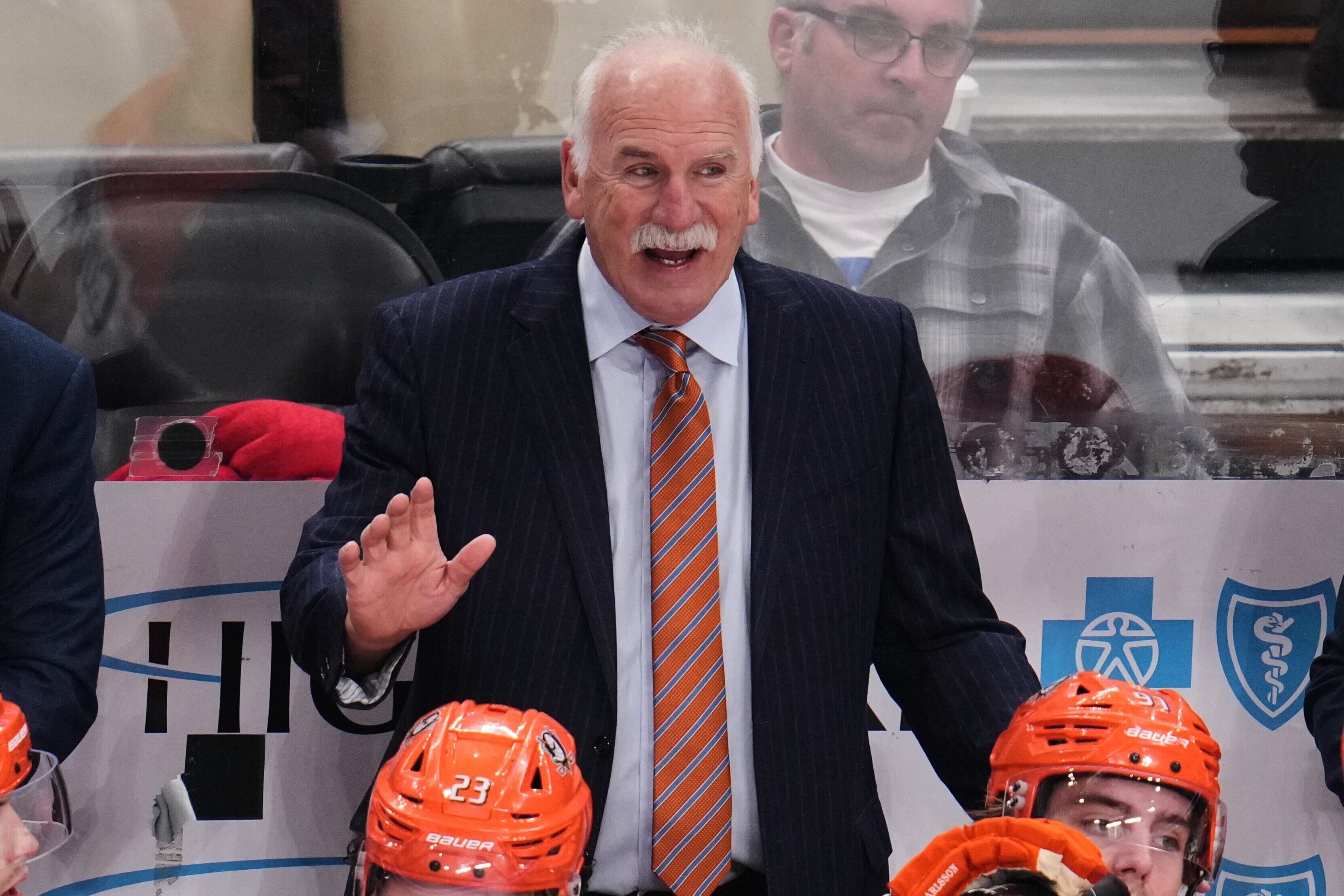 FILE -Anaheim Ducks head coach Joel Quenneville gives instructions during the overtime period of an NHL hockey game against the Pittsburgh Penguins in Pittsburgh, Dec. 9, 2025. 