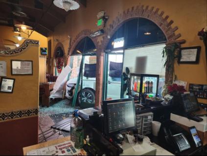 Elderly woman arrested after crashing into Sandy restaurant, police say