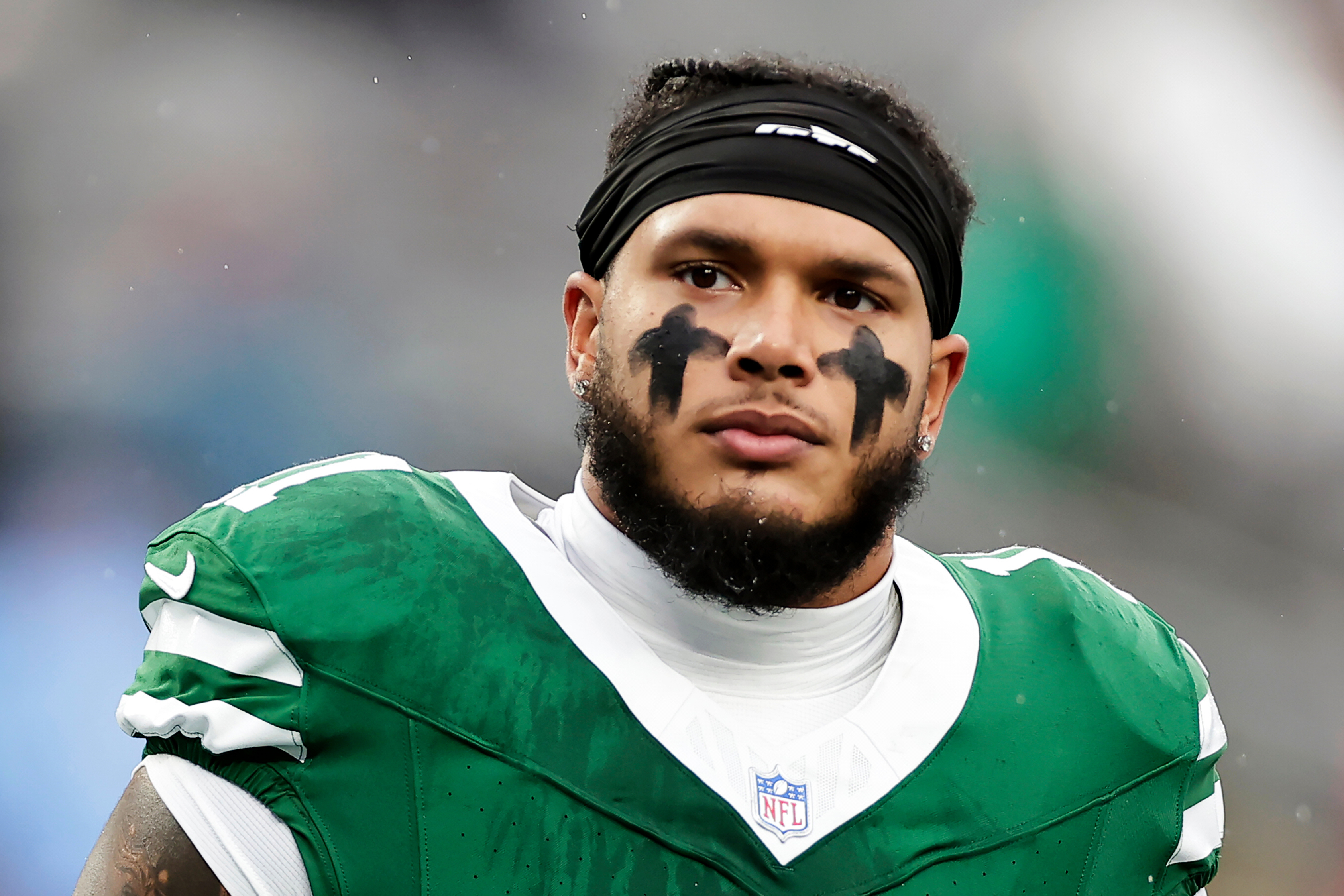 FILE - New York Jets linebacker Jermaine Johnson (11) warms up before an NFL football game against the Atlanta Falcons, Sunday, Nov. 30, 2025, in East Rutherford, N.J. 