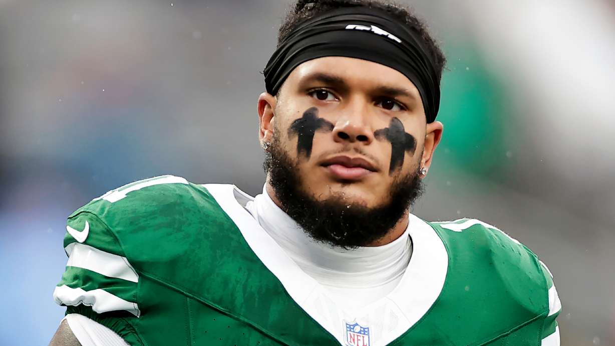 FILE - New York Jets linebacker Jermaine Johnson (11) warms up before an NFL football game against the Atlanta Falcons, Sunday, Nov. 30, 2025, in East Rutherford, N.J.