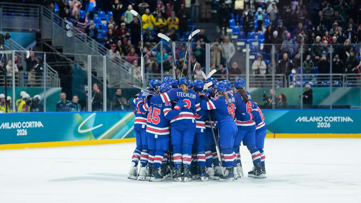 U.S. players celebrate after a semifinal match of women's ice hockey between the United States and Sweden at the 2026 Winter Olympics, in Milan, Italy, Monday, Feb. 16, 2026.