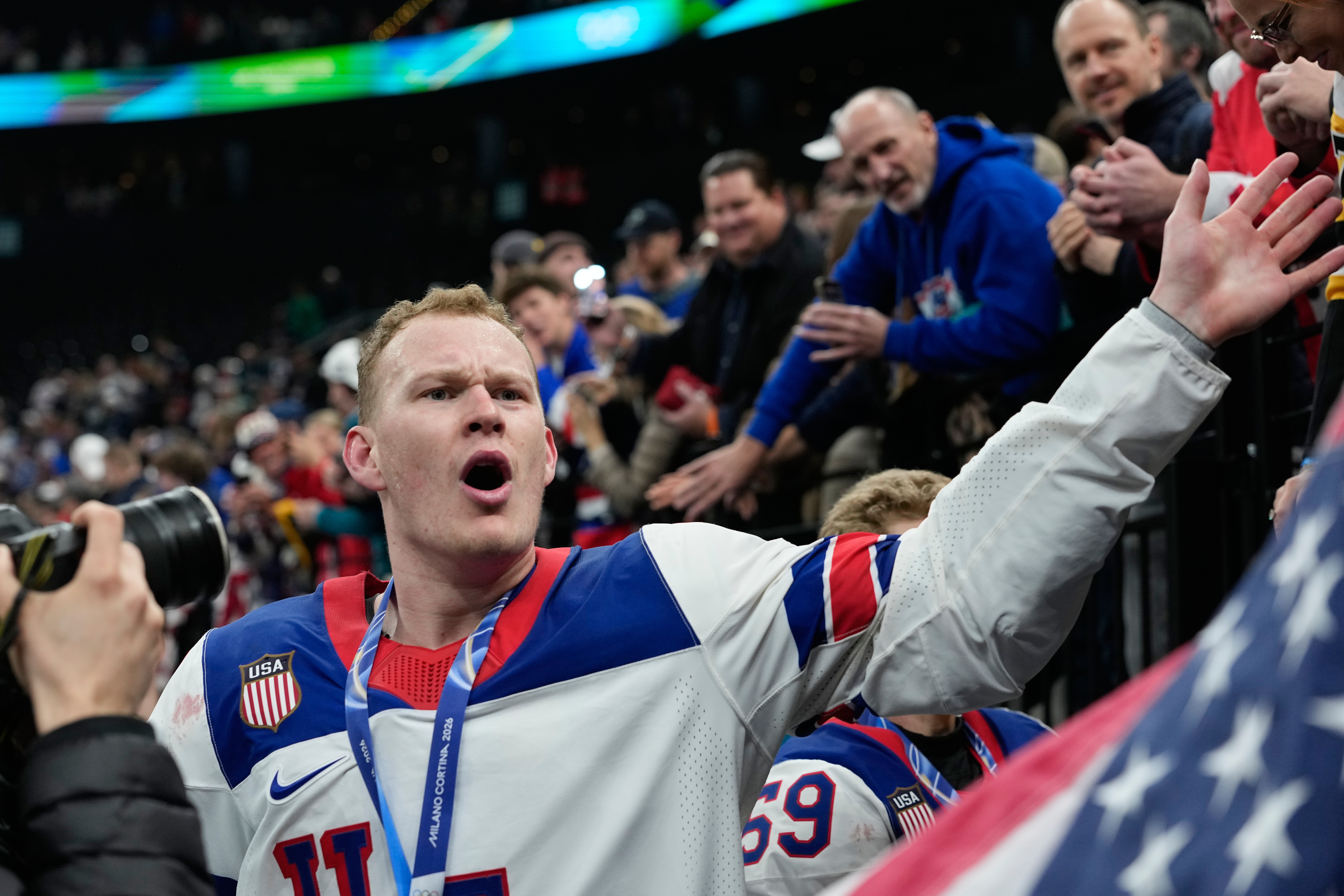United States' Brady Tkachuk (7) celebrates after the United States defeated Canada in a men's ice hockey gold medal game between Canada and the United States at the 2026 Winter Olympics, in Milan, Italy, Sunday, Feb. 22, 2026.